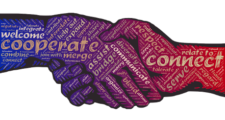 An illustration of two hands shaking. One has the word "cooperate" written on it and the other "connect". One hand is purple and the other red. Where they meet in the middle is maroon.
