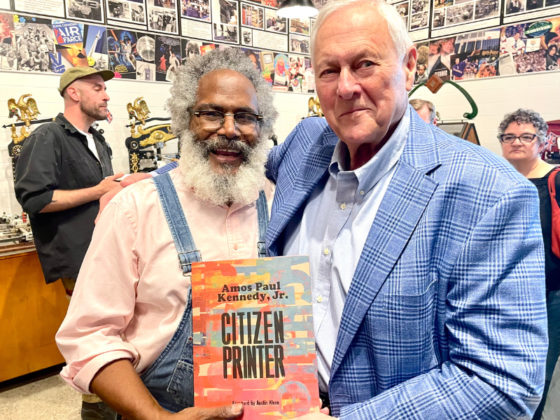 experiencing print with amos p kennedy jr Amos P. Kennedy Jr. with Gord Griffiths holding Citizen Printer at Howard Iron Works.