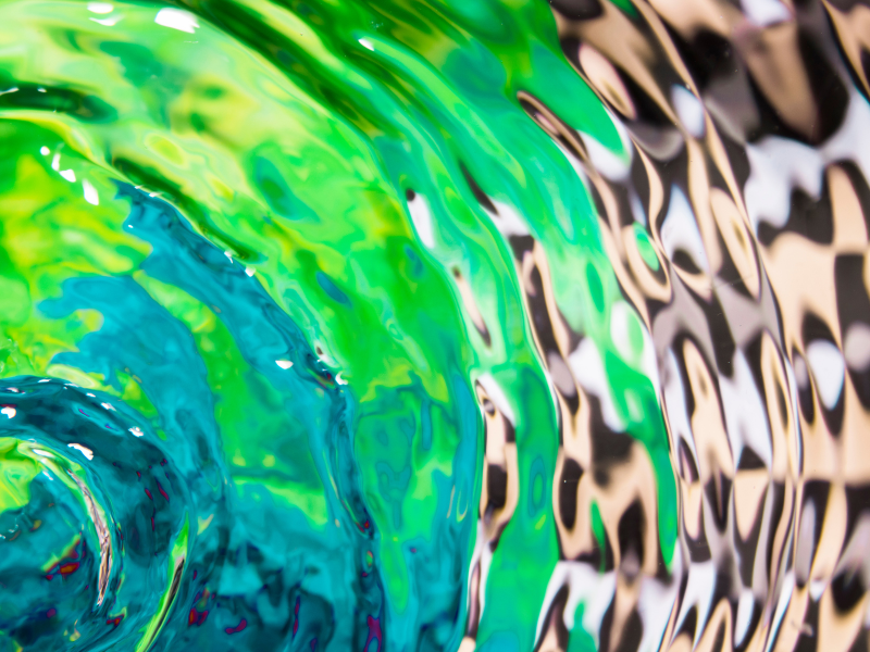 sustainable printing practices that improve profit Abstract green and blue fluid pattern representing sustainable printing practices, environmental responsibility, and operational efficiency in print production.