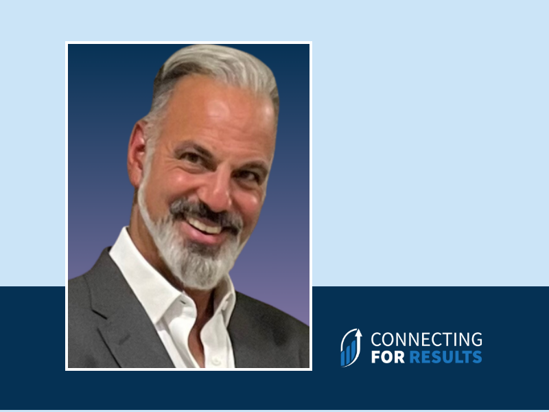 Alan Zel headshot in suit for a blog on executive search and talent assessment.