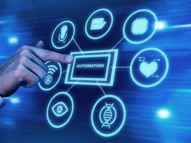 Hand selecting automation on a digital interface, reflecting responsible automation and employee change planning.